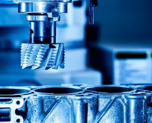 Milling tool machining a precision metal part