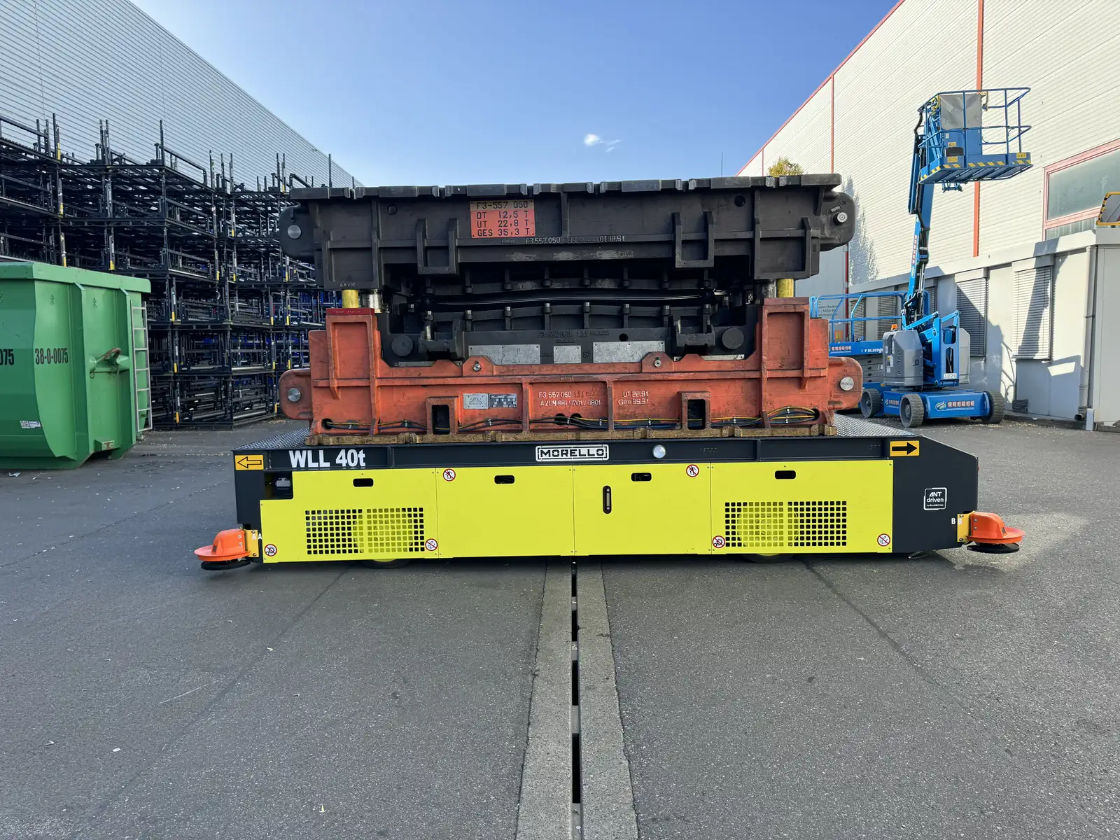 Morello AGV carrying a large mold at a loading bay