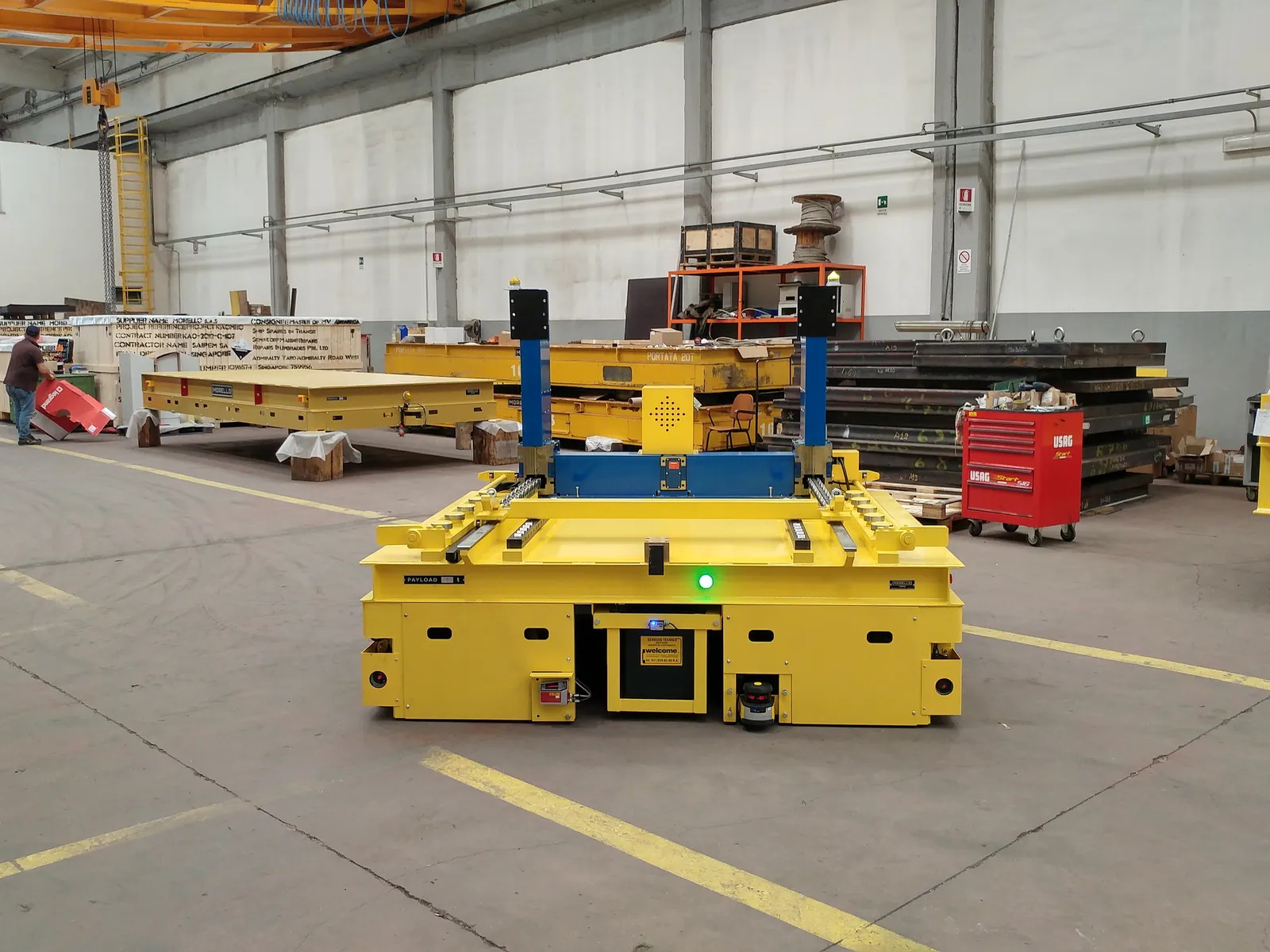 Yellow Morello AGV with a mold transfer station in a manufacturing plant