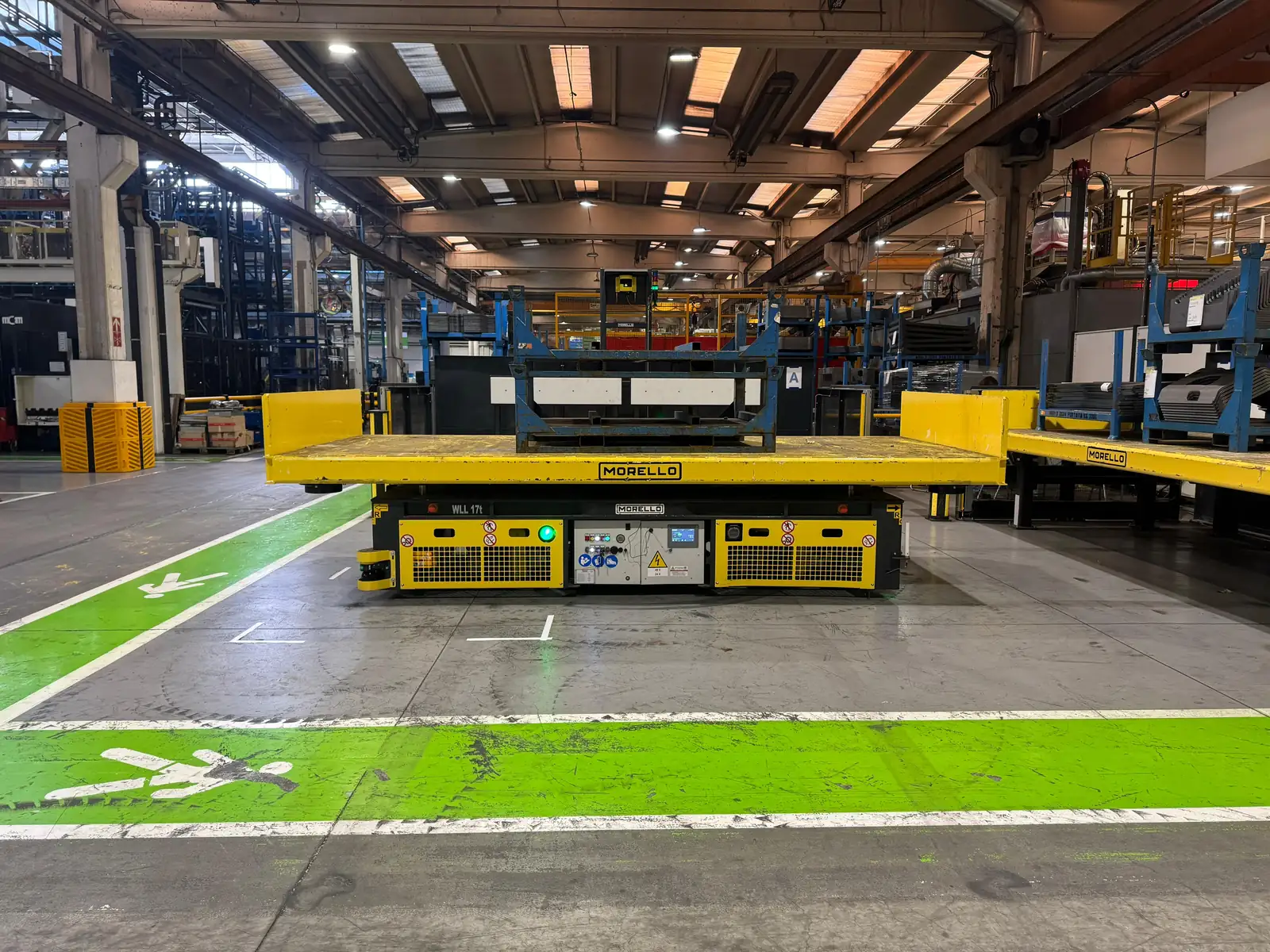Morello AGV moving component racks along a production line