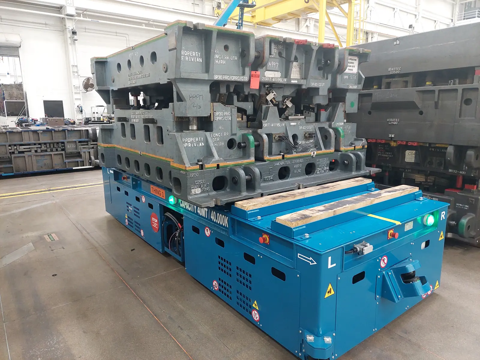 Blue Morello AGV transporting stacked stamping dies
