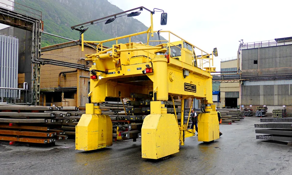 Morello diesel self-propelled straddle transporter working in a steel stockyard