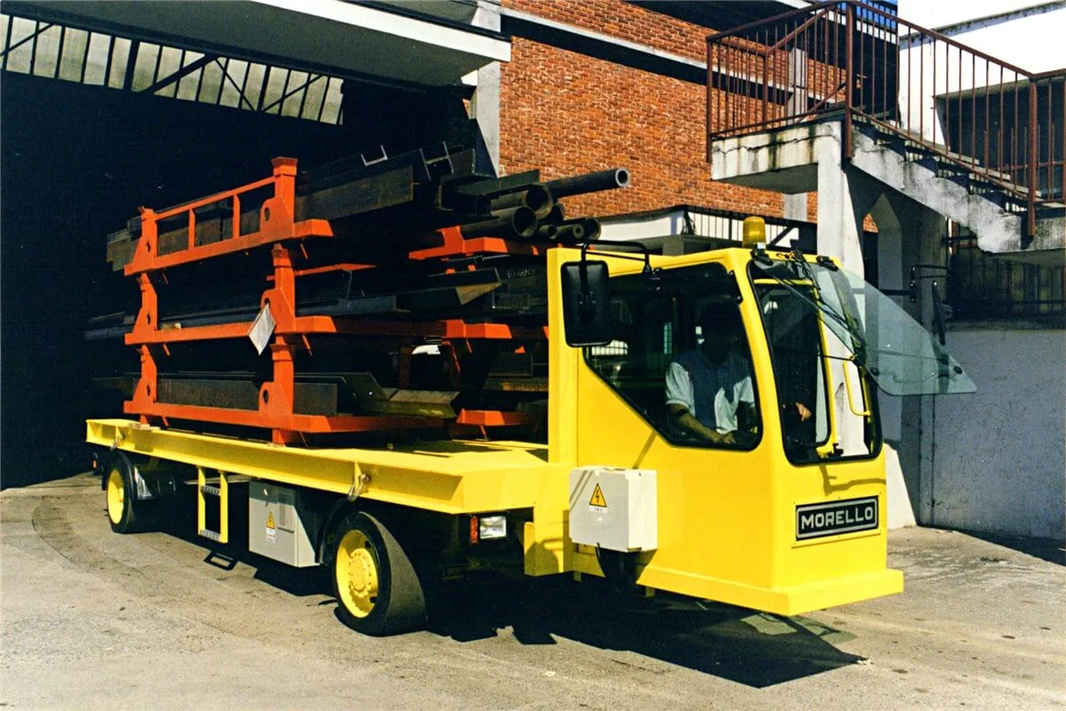 Morello 25 t electric transport truck carrying long bars on racks