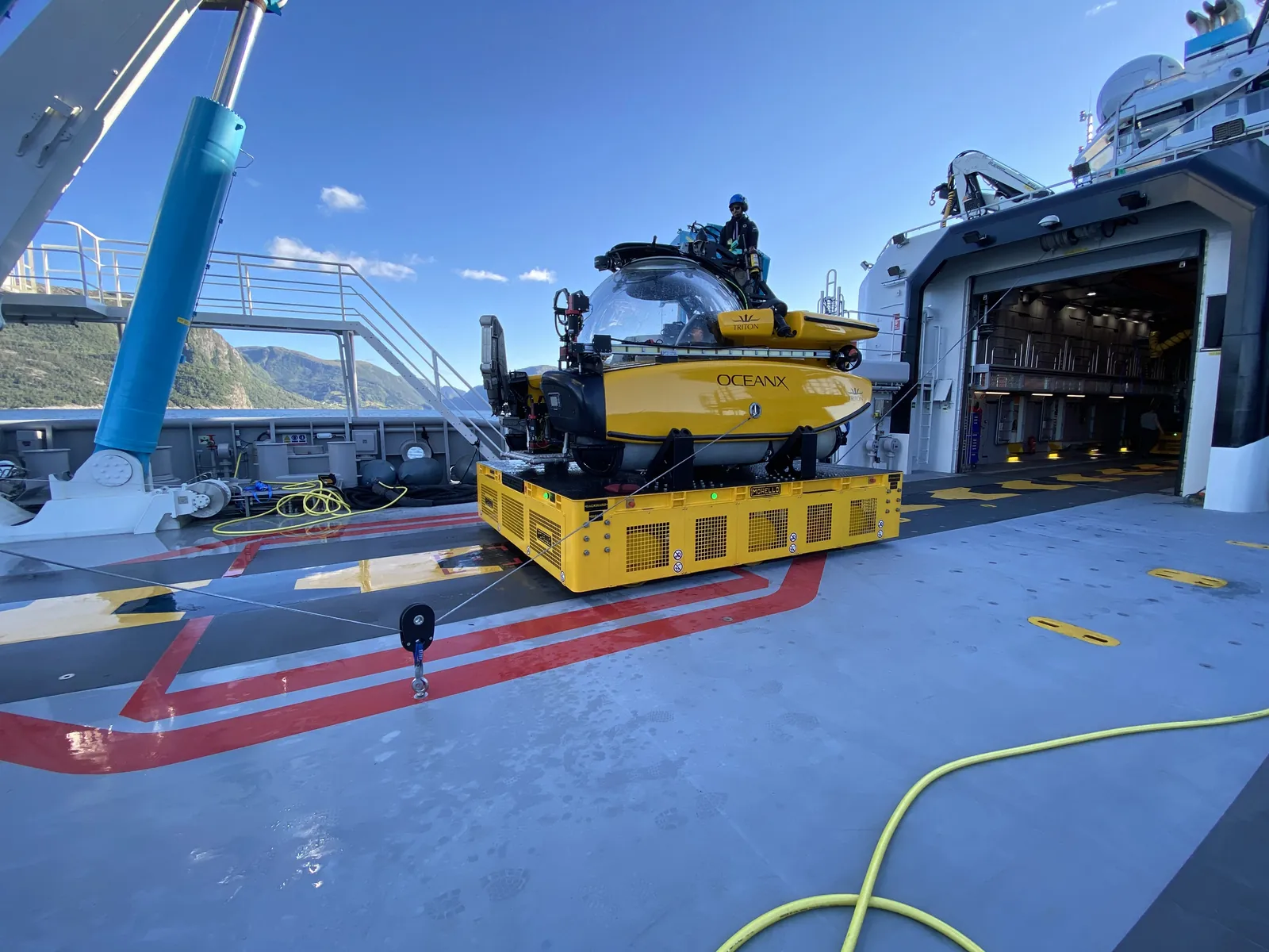Morello OMNI cart moving a vehicle on a ship deck