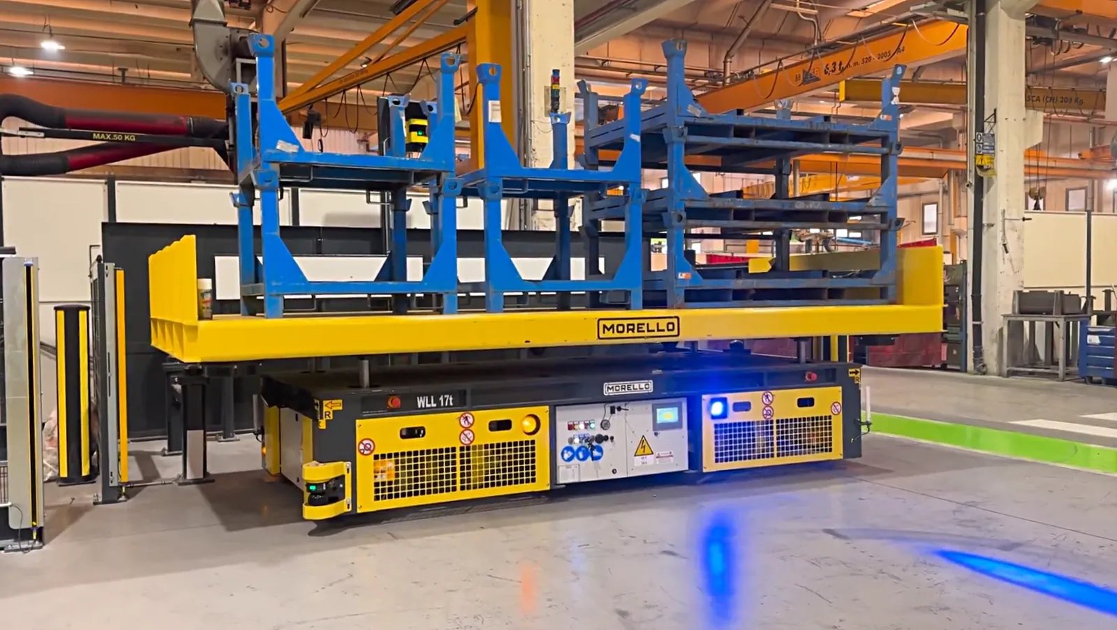 Morello omnidirectional AGV, 17 t capacity, moving a loaded component rack